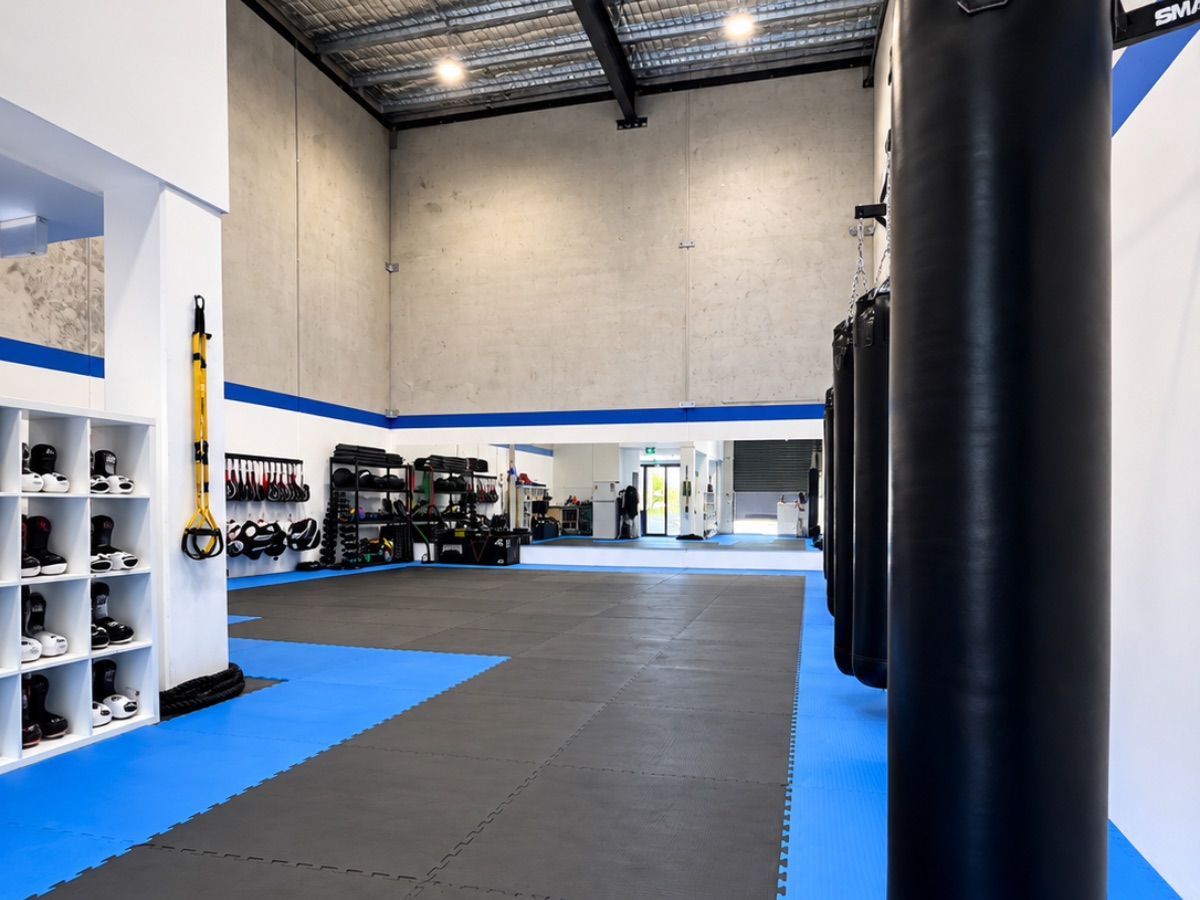 Training mats and equipment inside the TKA Martial Arts facility